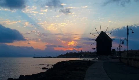 Sea and windmill Stock Photos