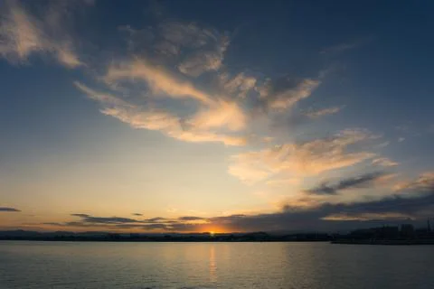 Sea background during sunset Stock Photos