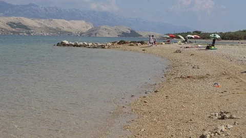Sea Bay Beach With Distant Rocky Mountains Stock Footage 98755232