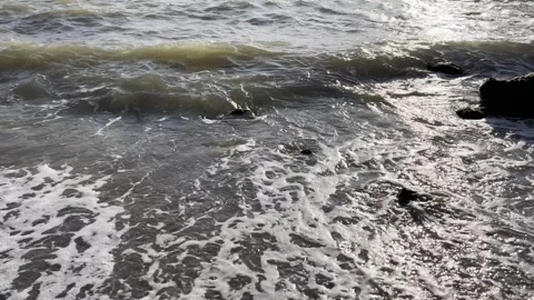 Sea beach in the evening, waves and interesting reflections. Stock Footage 330494993