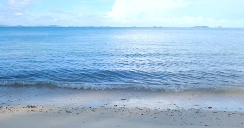 Sea beach with wave white sand turquoise water blue sky cloud Stock Footage 199897401