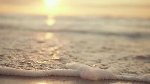 Sea beach with waves on a sunset background Stock Footage 159719066