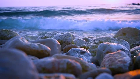 Sea is beating with waves on a stony shore. Full HD Video Stock Footage 89380565