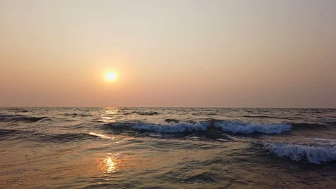 Sea on a beautiful sunset background Stock Footage 128841202