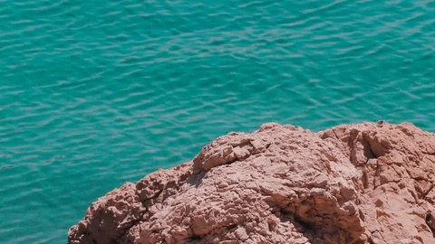 Sea behind the rock 9 Stock Footage 91282891