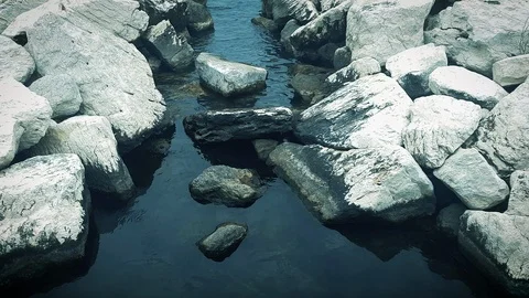 The sea behind the rocks Stock Footage 89565167