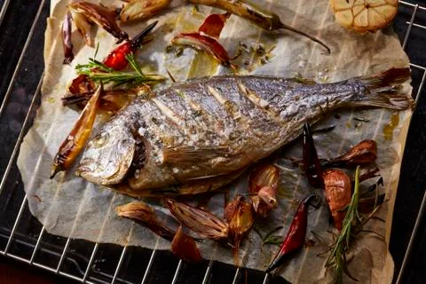 Sea bream on a cooking grid Stock Photos