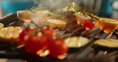 Sea bream falling on grill pan Stock Footage 311829608
