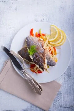 Sea Bream fish with vegetables Stock Photos