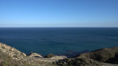 The sea in Calabardina under the blue sky, Murcia Stock Footage 89943696