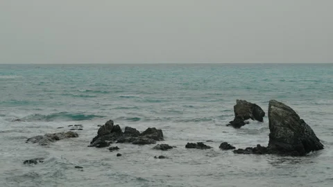 Sea Cliffs Emerging from the Water Like Shark Fins. Stock Footage 262362864