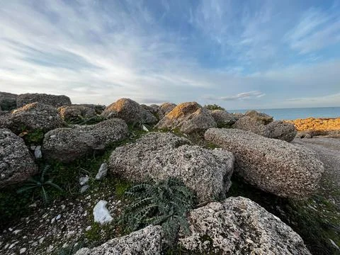 Sea close-up wide angle cliffs on the beach Stock Photos