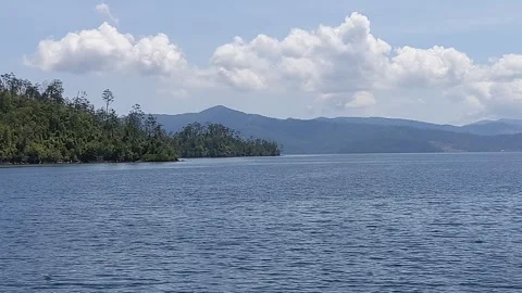 Sea, cloud and mountain views in Indonesia Stock Footage 294169003