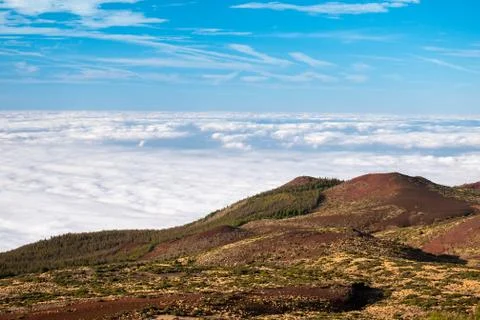 Sea of clouds below the summit of Teide volcano in Tenerife Stock Photos