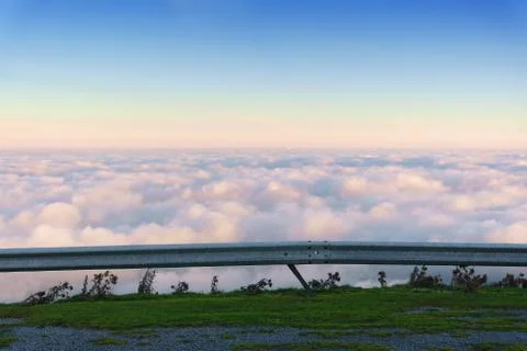 Sea of clouds from traffic barrier Stock Photos
