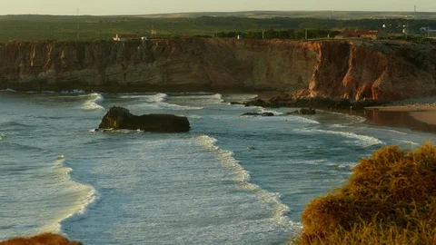 Sea coast cliffs surfers waves fields summertime Stock Footage 119041525