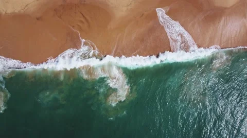 Sea coast, view from the height. Yellow sandy beach with blue sea. Stock Footage 174643629