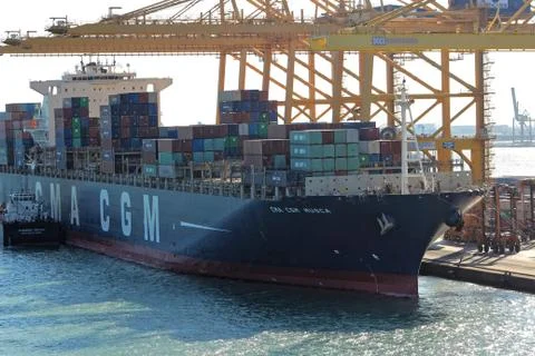 Sea Container Cargo Ship preparing for sea Stock Photos