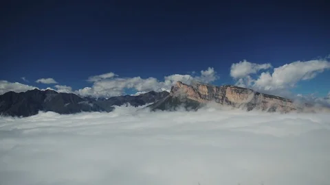 Sea Of Drifting Clouds. Full of Clouds over the mountain valley. Stock-Footage 87749767