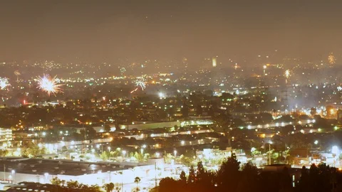 A sea of fireworks explode through the city of Los Angeles 스톡 동영상 119291928