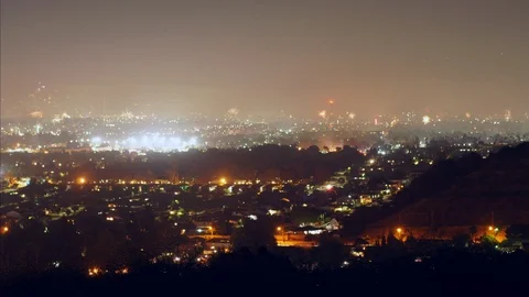 A sea of fireworks explode throughout the city of Los Angeles Stock Footage 119293722