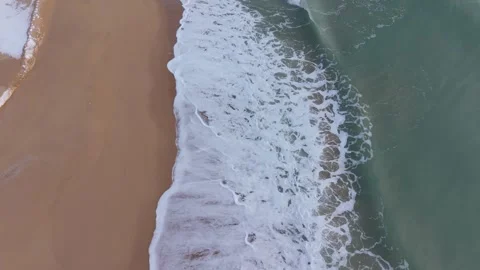 Sea Foam Rolling On Coast Stock Footage 328282035