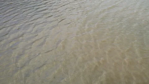 The sea formed small waves in slow motion. Concept of relaxation, tranquility Stock Footage 135436126