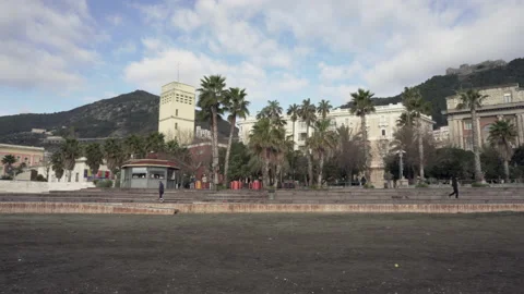 Sea front and man playing with the dog in Salerno in Italy Video stock 133159016