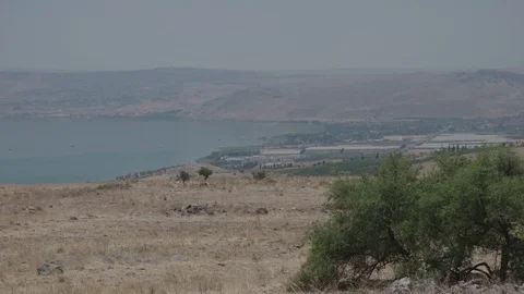 Sea of Galilee &amp; mountain range in background, panning shot Vídeos de archivo 85617403
