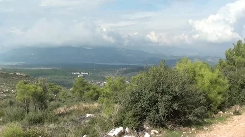 Sea hills clouds panning Stock Footage 20641894