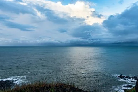 Sea horizon view with dramatic cloud from mountain top Stock Photos