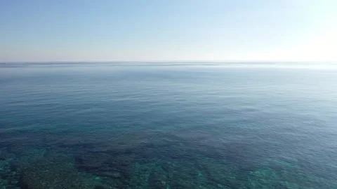 Sea Horizon wtih clear water reef/rocks underneath - Cyprus Limassol Stock Footage