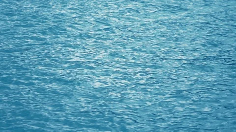 Sea idyll, texture of the surface of calm sea at dawn, sunny path on the water Stock Footage 91611874