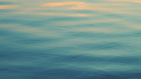 Sea idyll, texture of the surface of the calm sea at dawn. A sunny path water Stock Footage 91611974