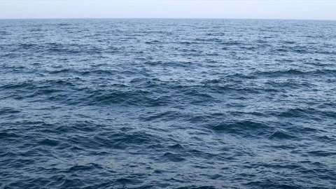 Sea idyll. Texture surface of a calm sea at sunset. Solar path on the water 91644564