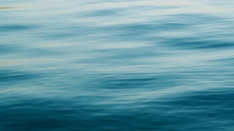 Sea idyll. The texture of the surface of the calm sea at dawn. Water deep Stock Footage 91725677