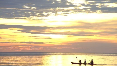 Sea kayaking at sunset Stock Footage 83356967