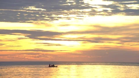 Sea kayaking at sunset Stock Footage 83358670
