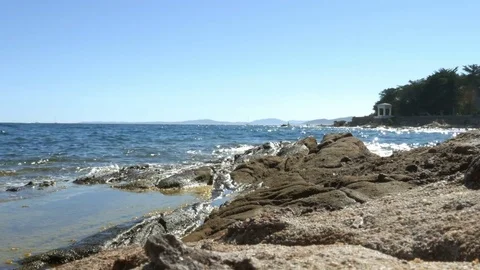 Sea landscape with rocks on a bright summer day - 4k Stock Footage 80368646