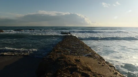 Sea landscape. Waves breaking at protecting spur. Stock Footage 121162500