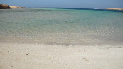 Sea lapping against a beach Stock Footage 36383309