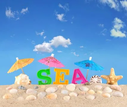 Sea letters on a beach sand Stock Photos