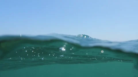 From sea level, camera's dive and return illustrate a sinking despair scenari Stock Footage 251324553