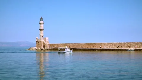 Sea lighthouse in front of the harbor. Stock Footage