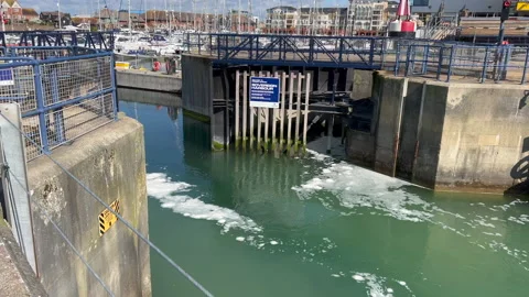A sea lock being opened Stock Footage 239652570