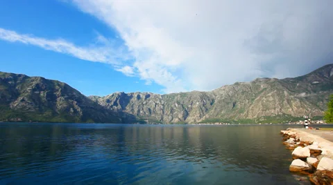The sea, mountains and sky with clouds Stock Footage 29905422