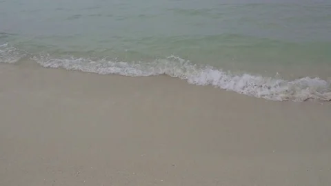 Sea ocean surf HD slow-motion nature video. Water wave on sand beach coast Stock Footage 74729103