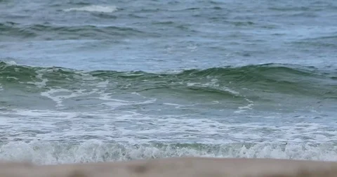 Sea ocean waves breaking to shore close up 4k. Foam tide waters crash roll Stock Footage 80051959