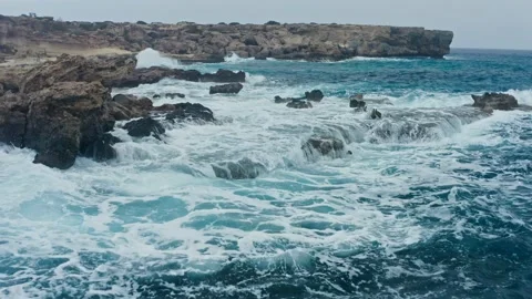 Sea ocean waves splash rocks background nature water blue Stock Footage 168752979