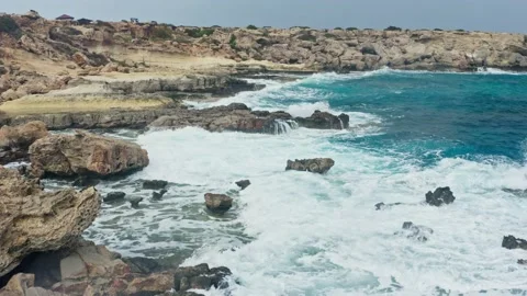 Sea ocean waves splash rocks background nature water blue Stock Footage 168753848